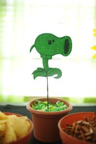 This was a challenge! Hand-drawn Peashooter Centerpiece made from felt with details created by hand using fabric paint.