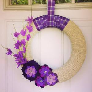 Her teacher's favorite color is purple! So I created a wreath with purple floral embellishments. 